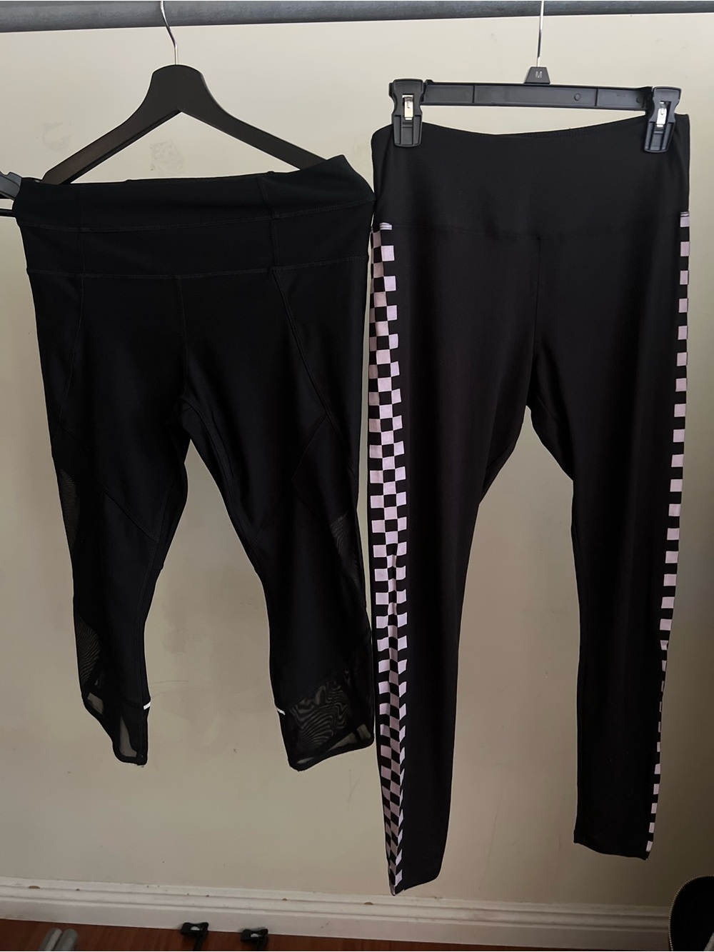 black leggings feature a distinctive white and black checkered pattern stripe al